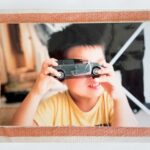 ドイツ子育て後悔｜額縁に入った子供の頃の写真